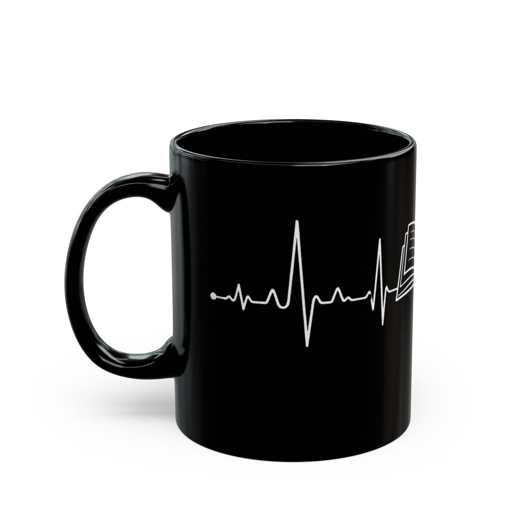 Black mug with humorous text on a white background
