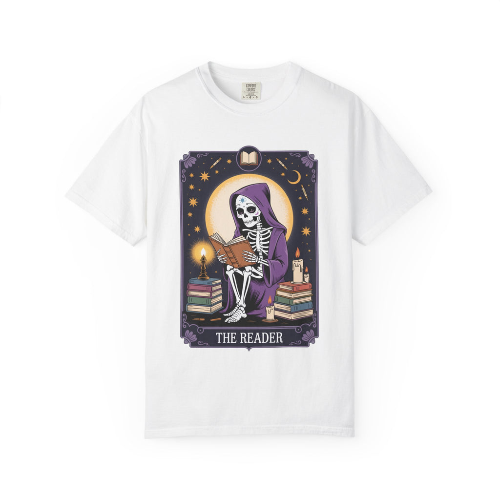 White t-shirt with a skeleton reading a book graphic and 'The Reader' text on a white background