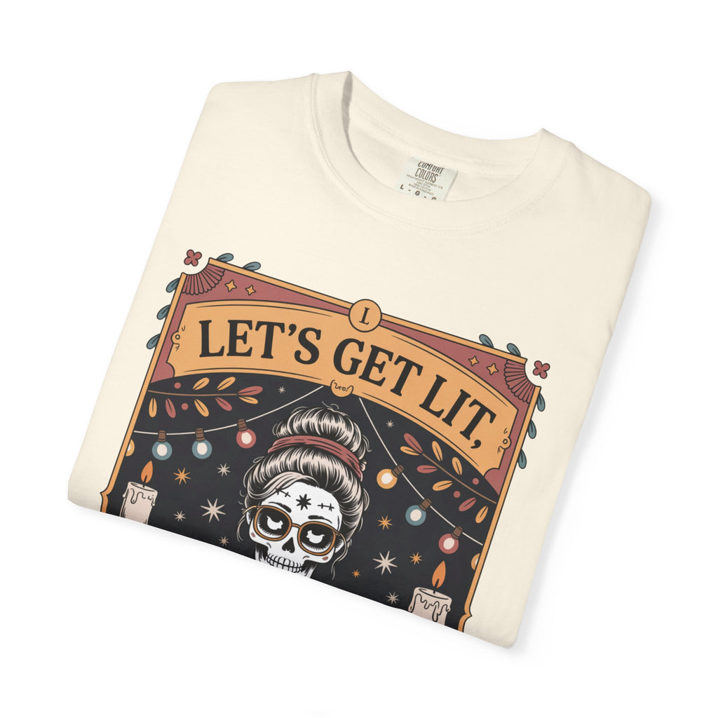 Folded t-shirt with 'Let's Get Lit' graphic design on a white background