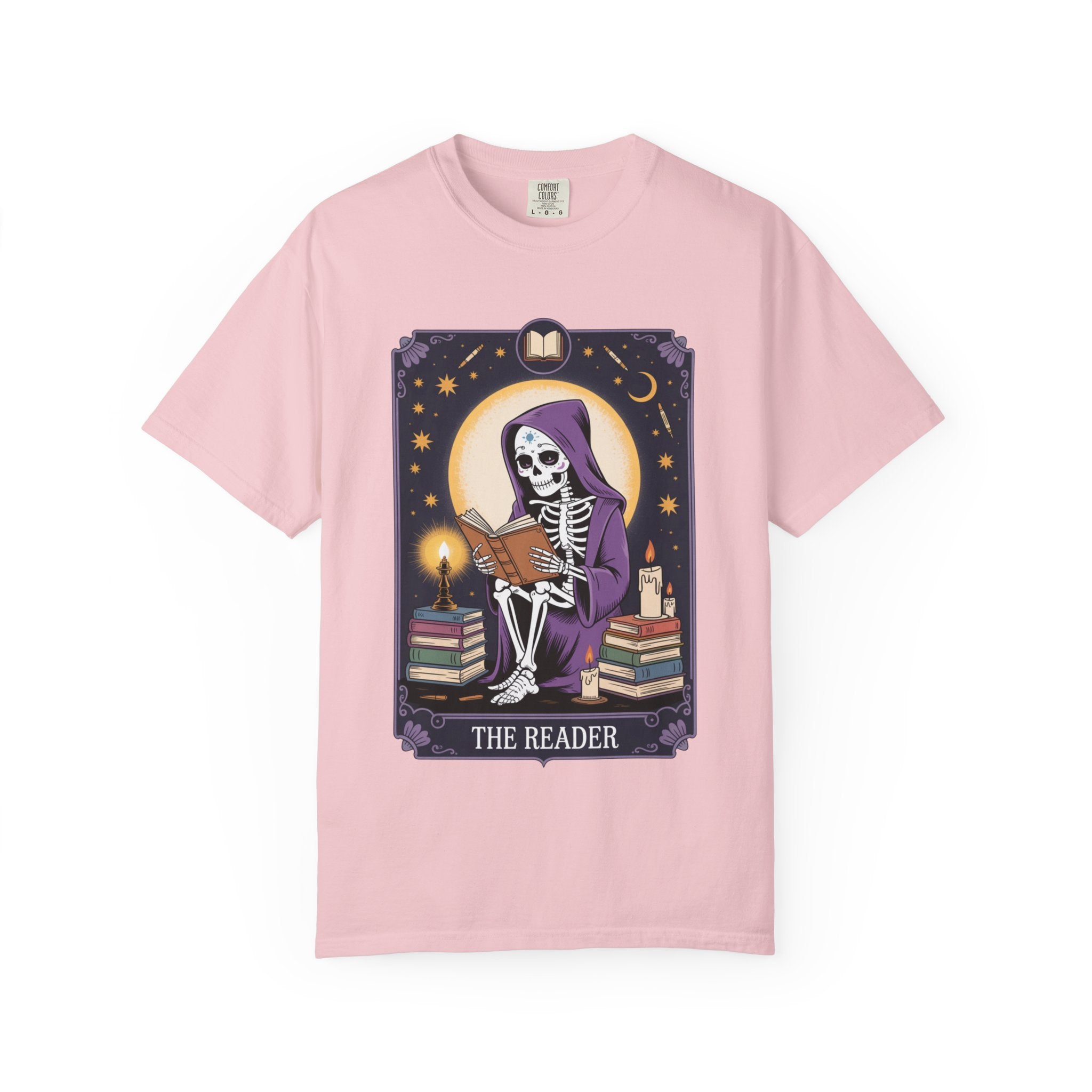 Pink t-shirt with a skeleton reading a book design on a white background