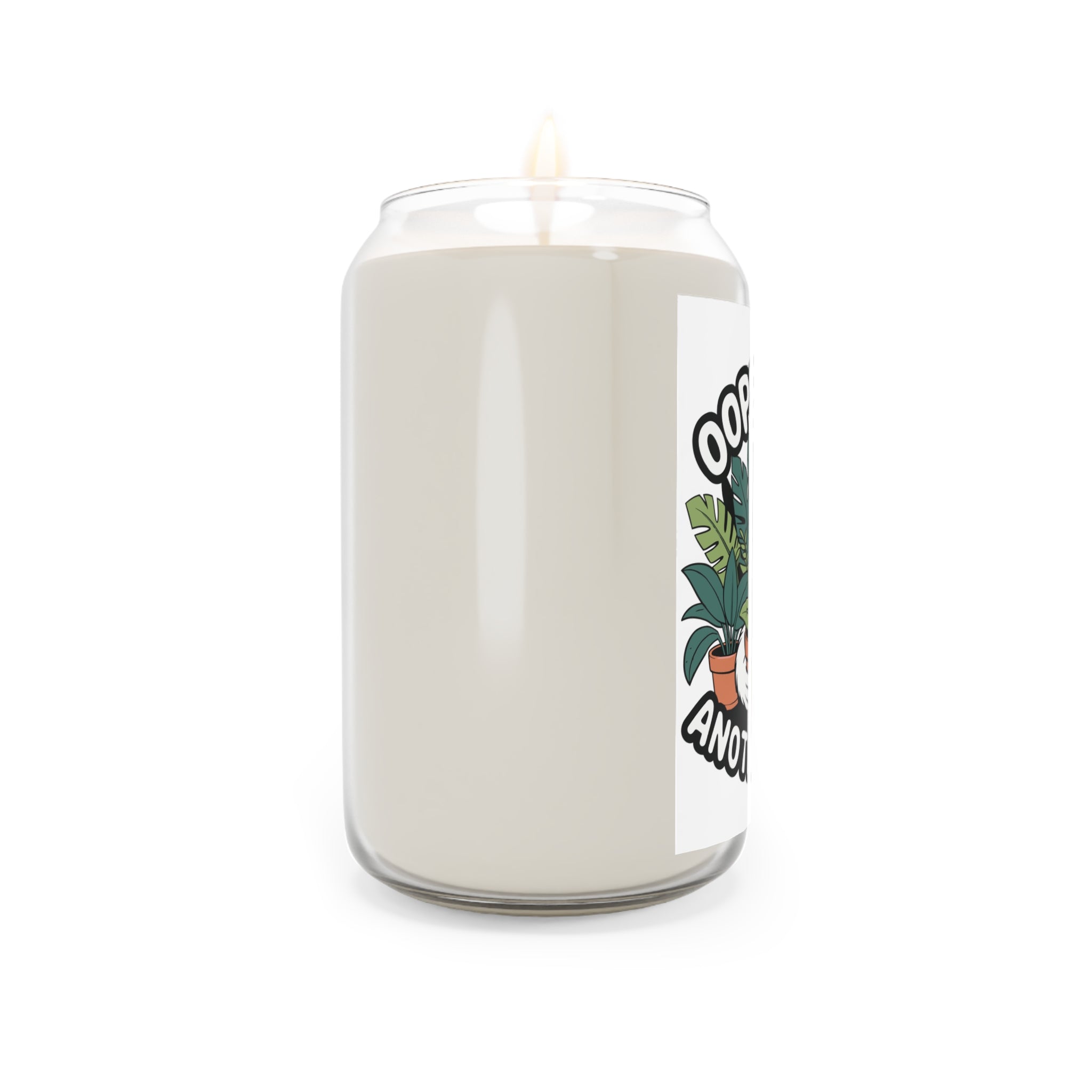 White candle in a glass jar with a label featuring a palm tree design on a white background